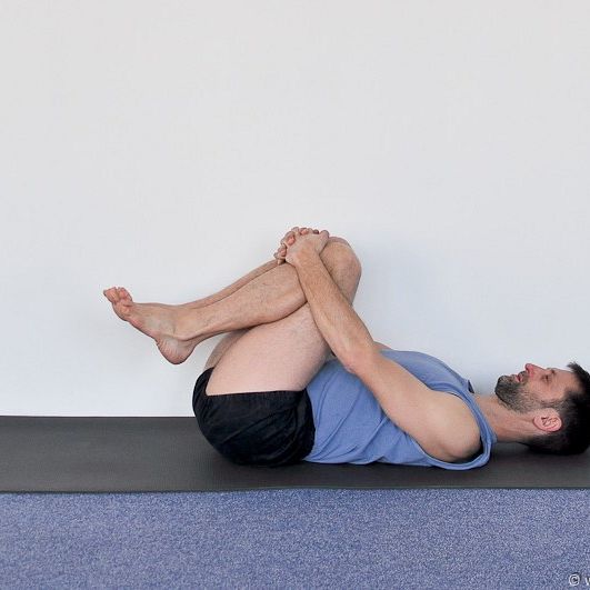 SUPTA DIVI PADA PAVANAMUKTASANA